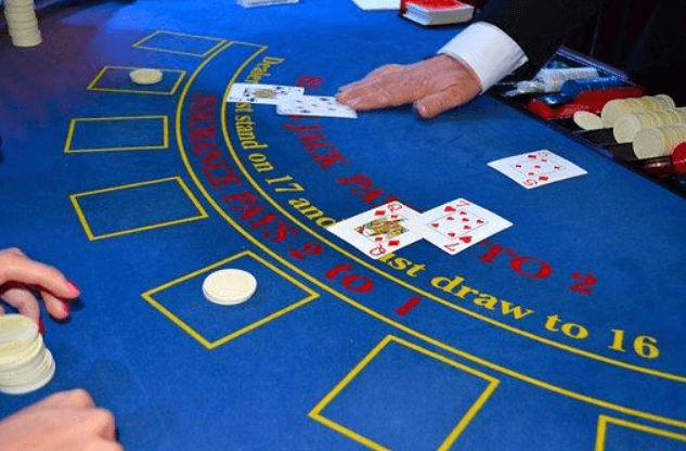 Blackjack table with Insurance side bets paying 2:1